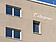 degewo-Logo an Hauswand Neubau Klimahaus