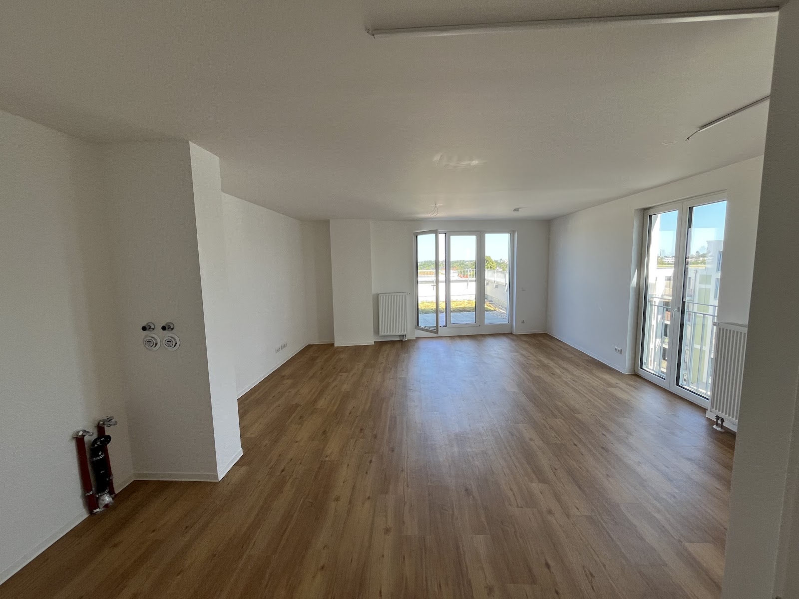 تصویر 3 Zimmerwohnung im Neubau mit Terrasse