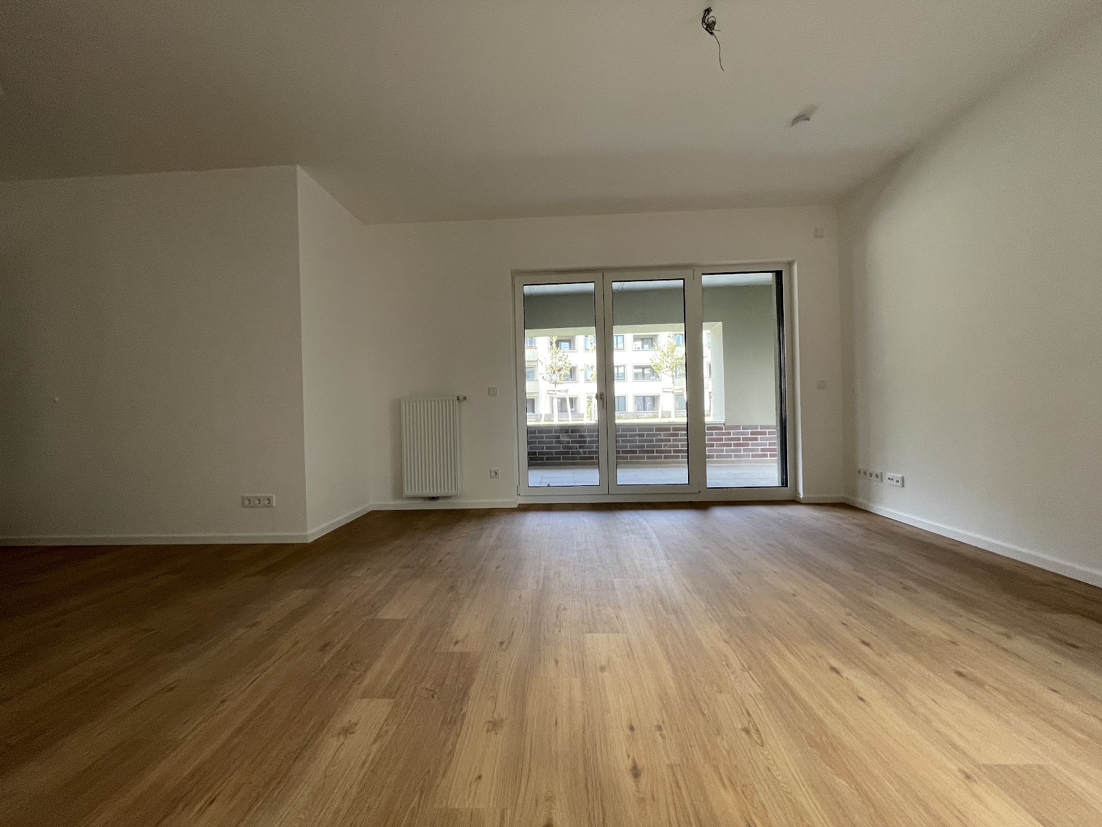 Wohnen im Neubauerdgeschoss - Terrasse mit Zugang zum Spielplatz – Foto 16