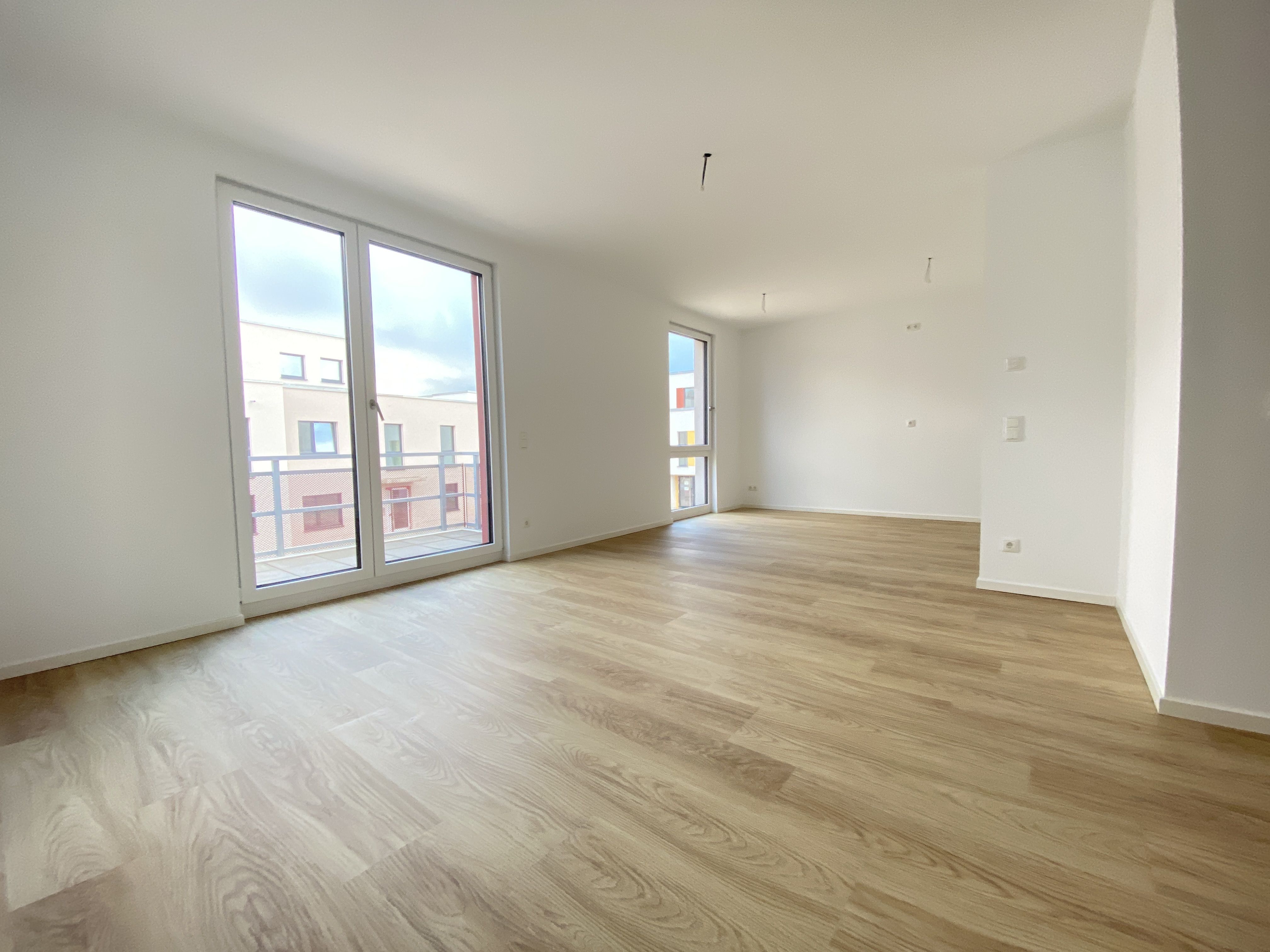 Innenansicht degewo-Neubau Fürstenwalder Allee 324/326: leeres Zimmer.